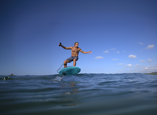 Person surfing on an eFoil