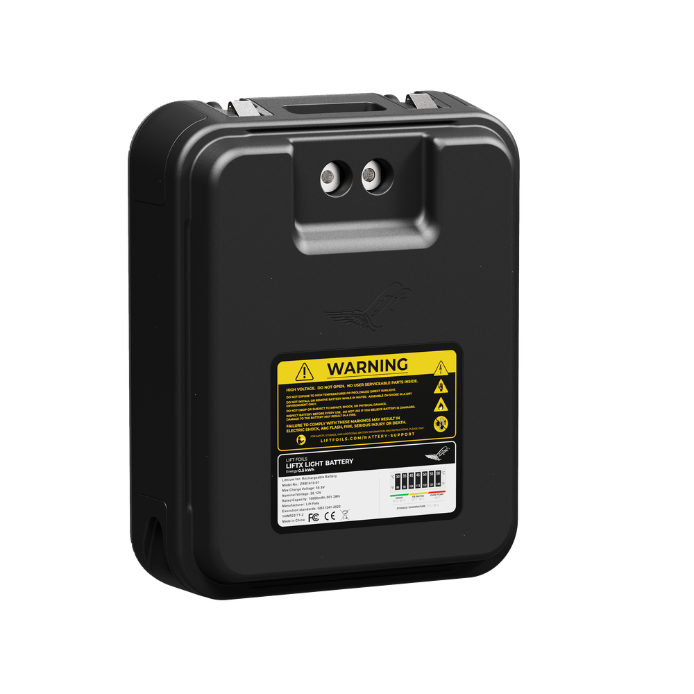 Black battery pack with warning label on a white background